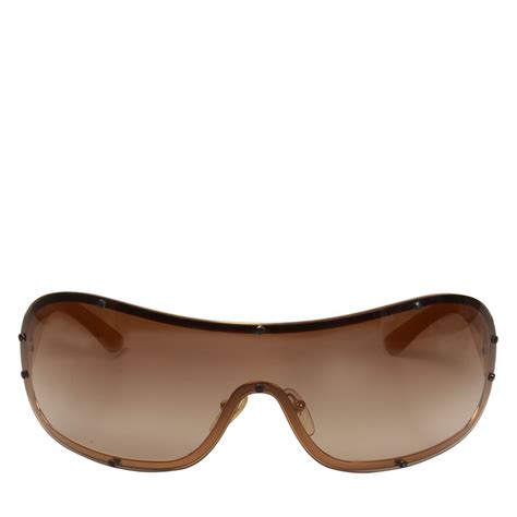 prada shield sunglasses brown